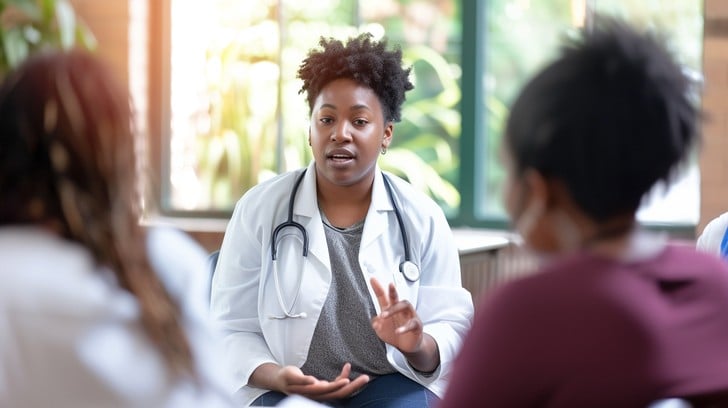 A healthcare professional discussing Medicare options with senior patients