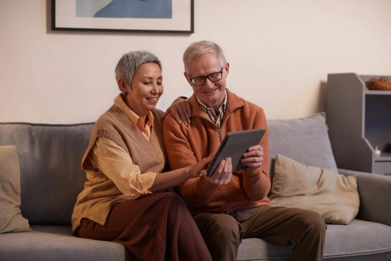 A senior couple exploring ways to save money with Medicare Part D.