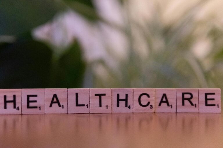 scrabble tiles spelling out “healthcare.”